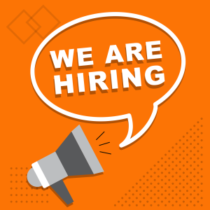 An orange graphic with white text saying "We are hiring" in a speech bubble, coming out of a grey magaphone