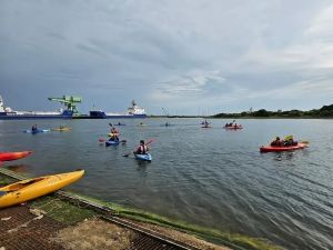 A photo of canoeists on water