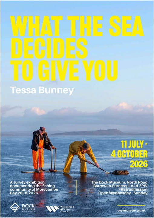 A poster for the exhibition, with title in large yellow text. A photo shows two men, stood on boards and waring waterproofs, working on mudflats, with islands/hills and the sea behind them.